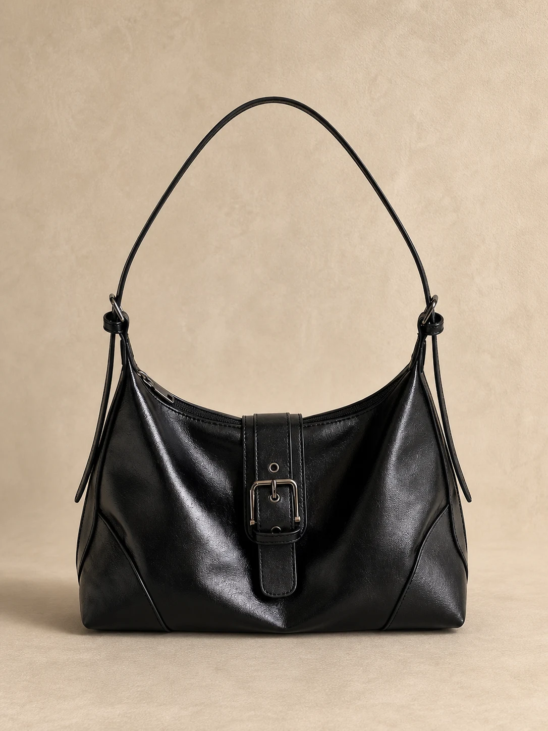 Black glossy buckle underarm shoulder bag front view