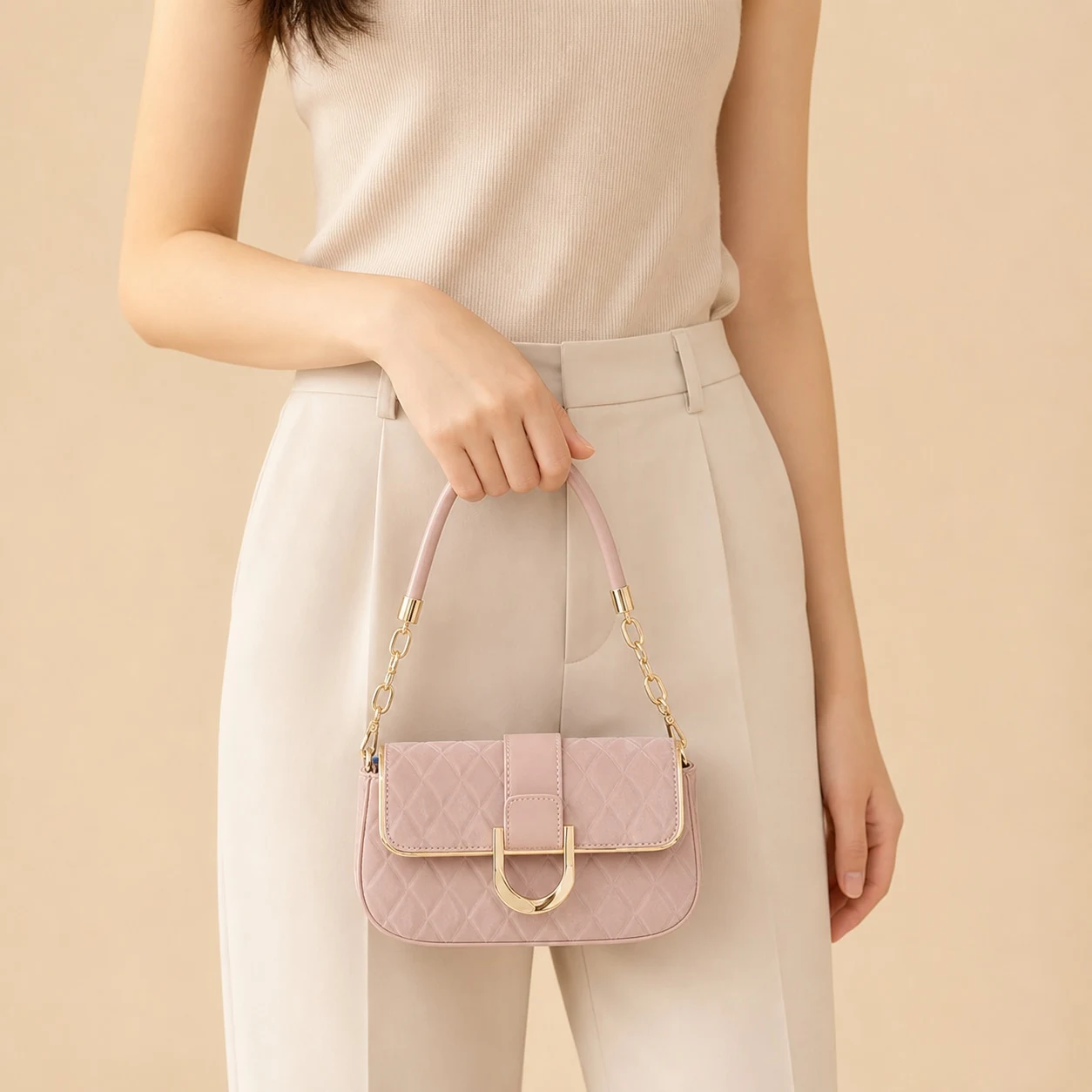 Pink quilted chain bag hand carry styling
