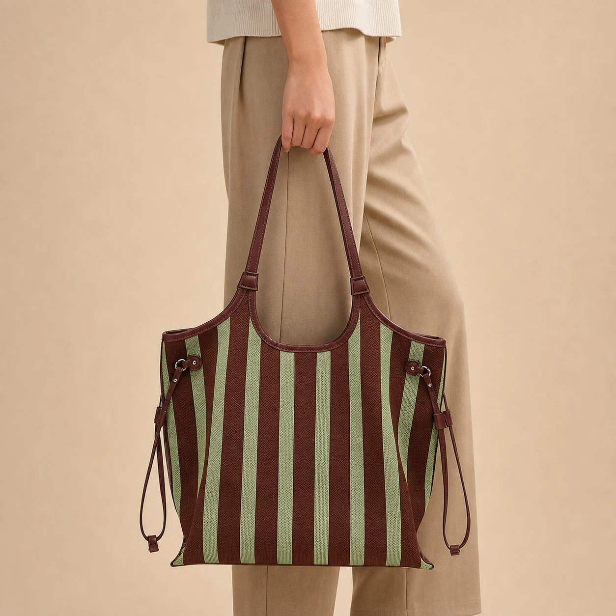 Brown and green striped tote hand carry styling