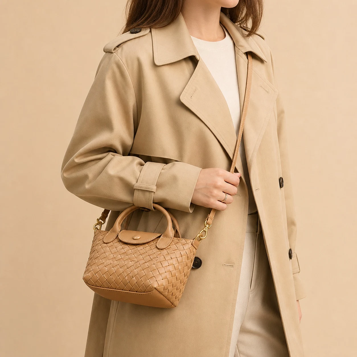 Tan woven satchel crossbody styling with trench coat